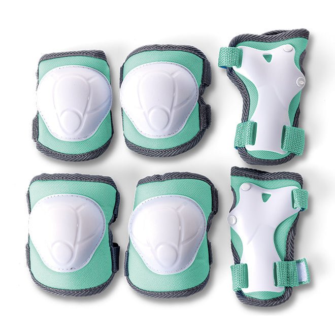 YVOLUTION | KIDS TWISTA LEARNER SKATES (SIZE 7 - 11) - PINK *PRE - ORDER* SKATES + GREEN SAFETY PADS by YVOLUTION - The Playful Collective