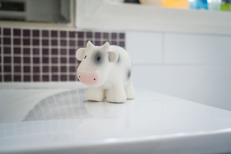 NATURAL RUBBER BABY RATTLE & BATH TOY - COW by TIKIRI - The Playful Collective