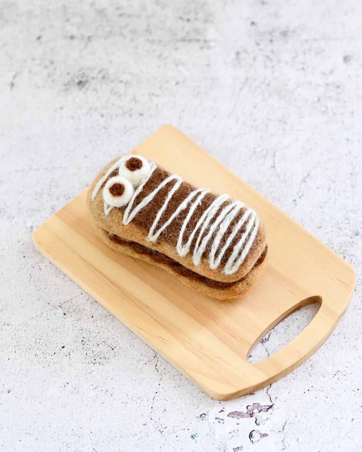 TARA TREASURES | FELT MUMMY CHOCOLATE ECLAIR FOR HALLOWEEN by TARA TREASURES - The Playful Collective