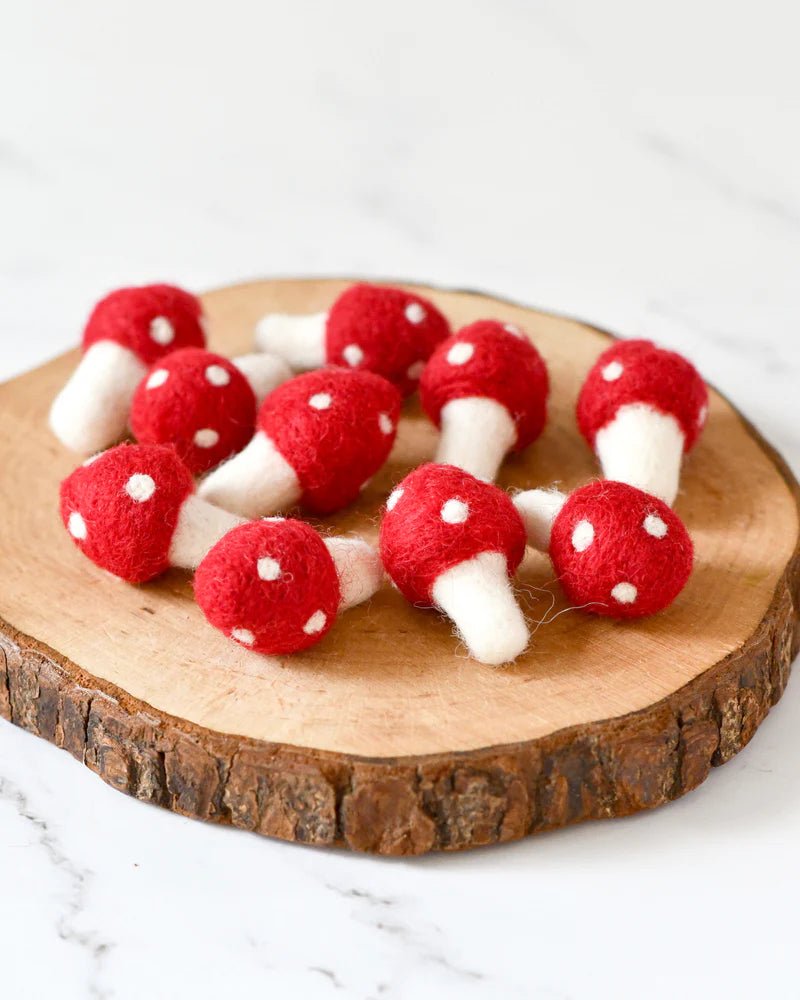 FELT RED MUSHROOMS (SET OF 10) by TARA TREASURES - The Playful Collective
