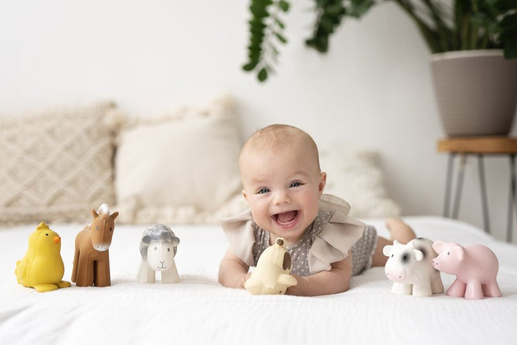 NATURAL RUBBER BABY RATTLE & BATH TOY - COW by TIKIRI - The Playful Collective