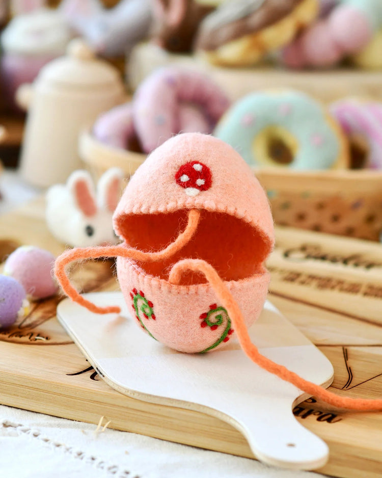 TARA TREASURES | FELT EGG COVER - PEACH WITH MUSHROOM MOTIF *PRE-ORDER* by TARA TREASURES - The Playful Collective