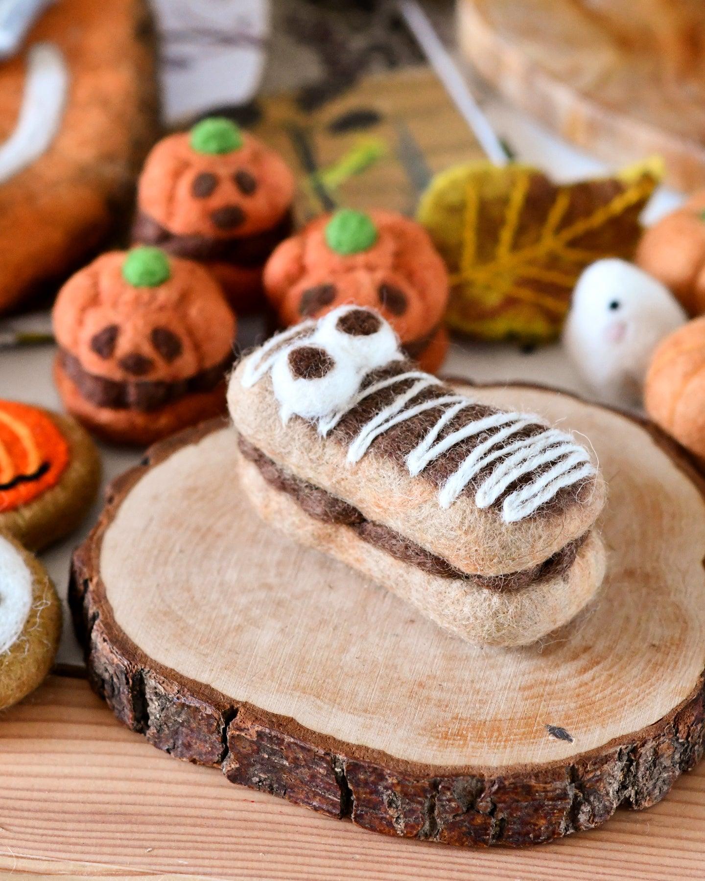 TARA TREASURES | FELT MUMMY CHOCOLATE ECLAIR FOR HALLOWEEN by TARA TREASURES - The Playful Collective